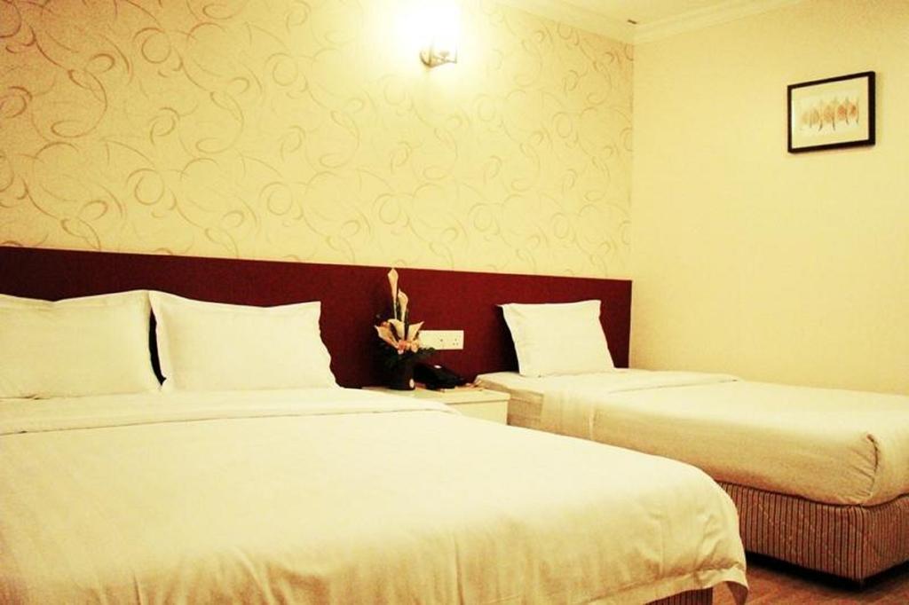 Adel Hotel Putatan Værelse billede